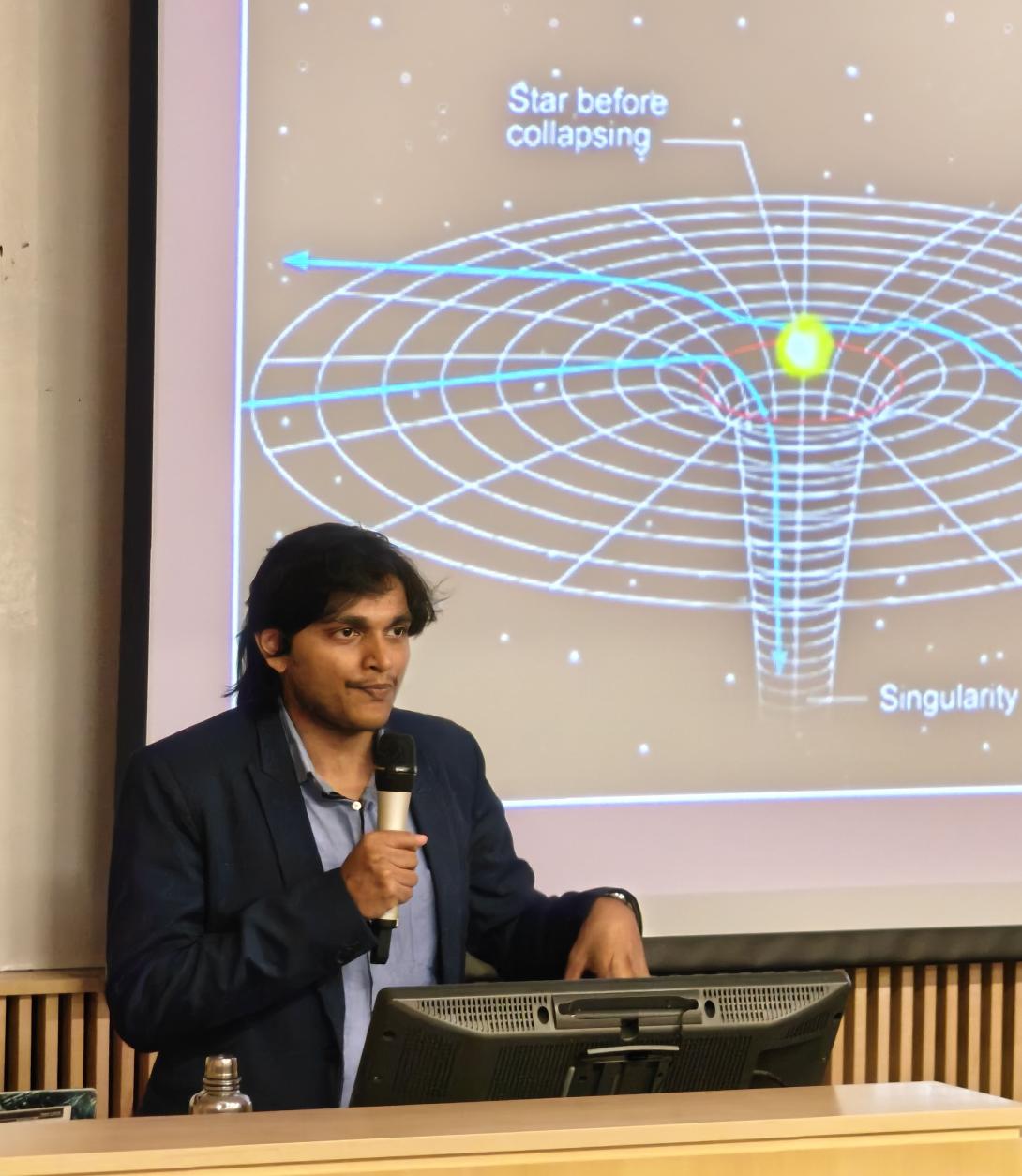Hrishabh giving a talk